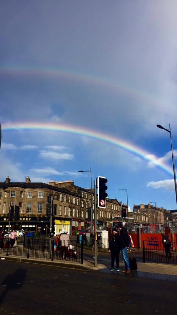 A double rainbow over Haymarket in Edinburgh, showing me Scotland is quite the magical place
